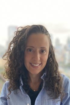 photo of Amanda in front of cityscape background