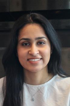 Headshot of Anjali wearing white