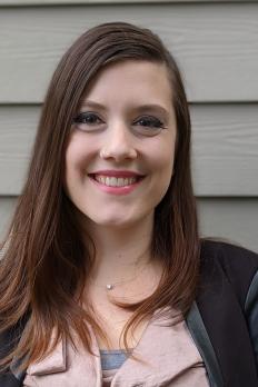 photo of Anjel in front of building