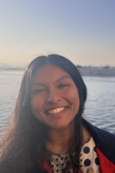 photo of Charvi in front of ocean