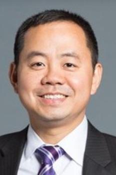 headshot of Ilseung in front of grey background