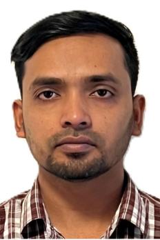 photo of Imadul in plaid shirt