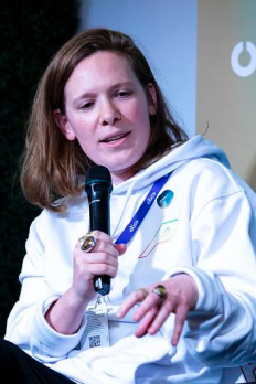 photo of Isabel speaking at a conference