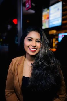 photo of Rebecca in a restaurant