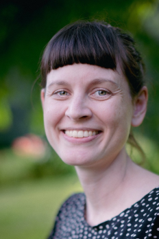 headshot of Sandra outdoors