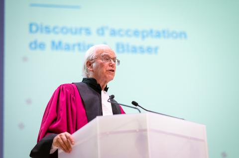 Martin Blaser gives speech at podium