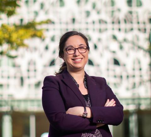 photo of Anna Schapiro in front of building