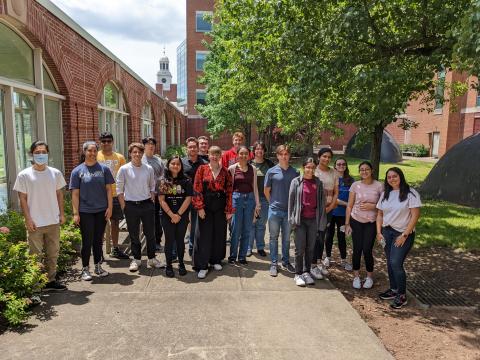 Group photo of CABM SURE mentors and students in the courtyard