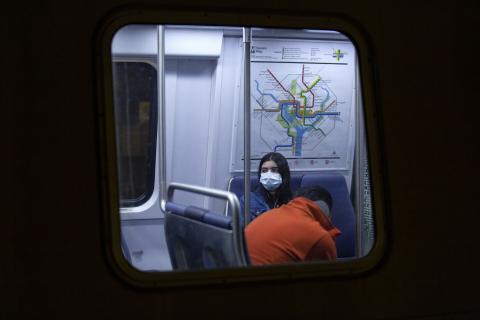 A commuter on the Washington C.C. Metro on March 9