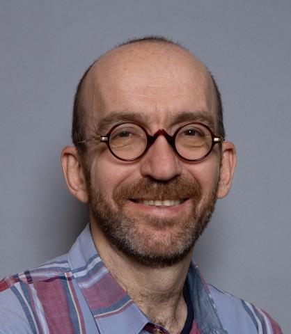 Headshot of Dima Rinburg
