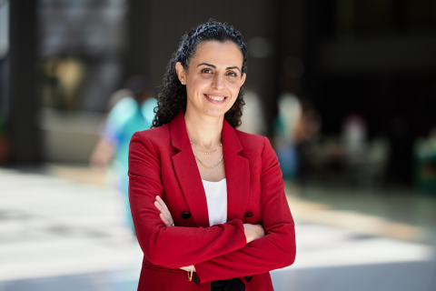 photo of Hala standing in courtyard