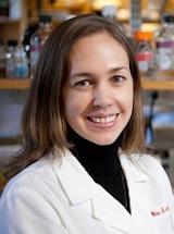 photo of Kathryn Wellen in lab coat