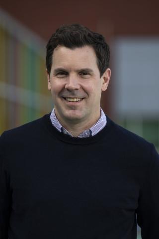 photo of time in black sweater