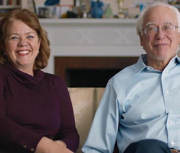 Gloria Dominguez Bello and Martin Blaser sitting on couch